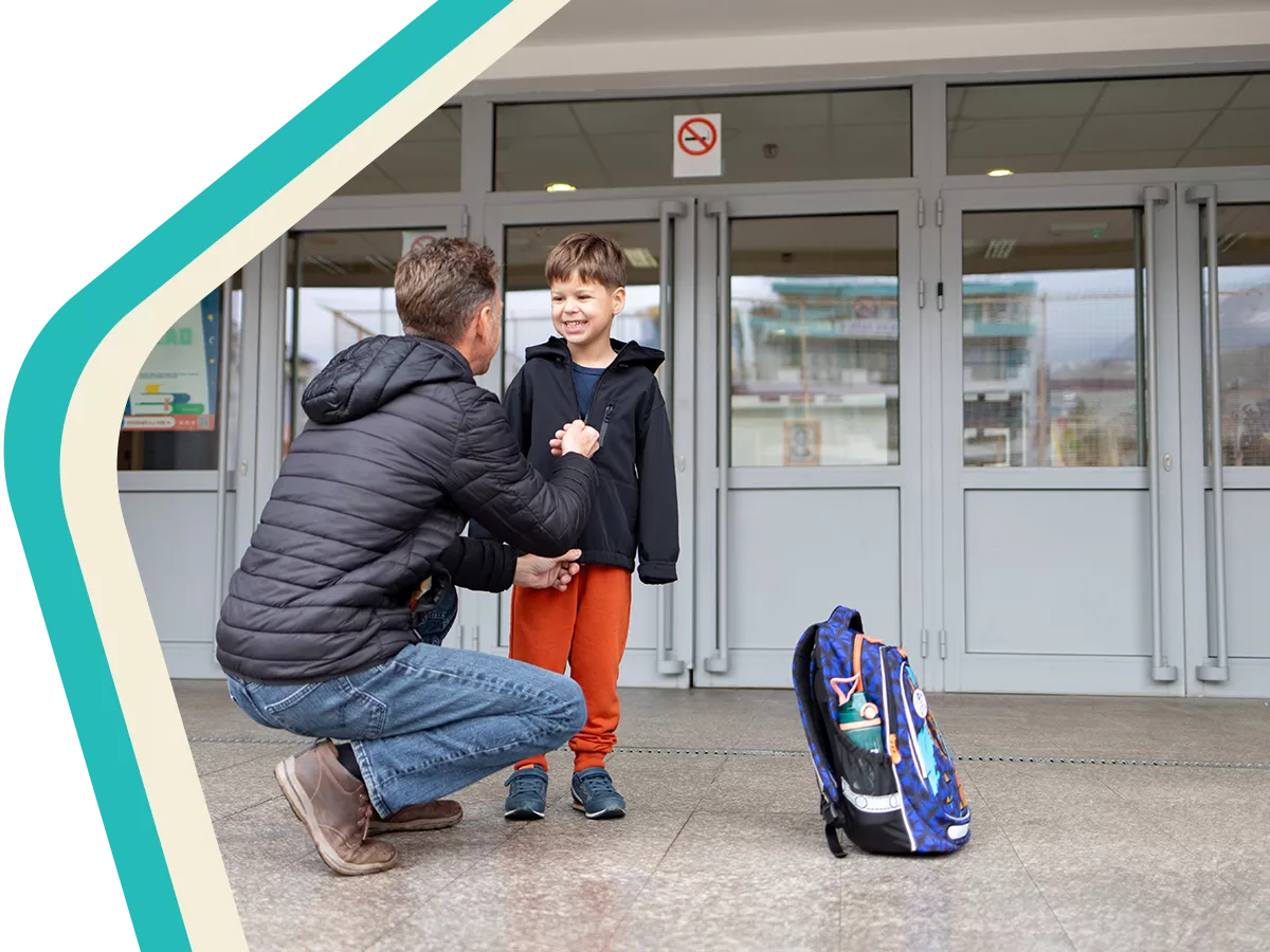 Father collecting child from school