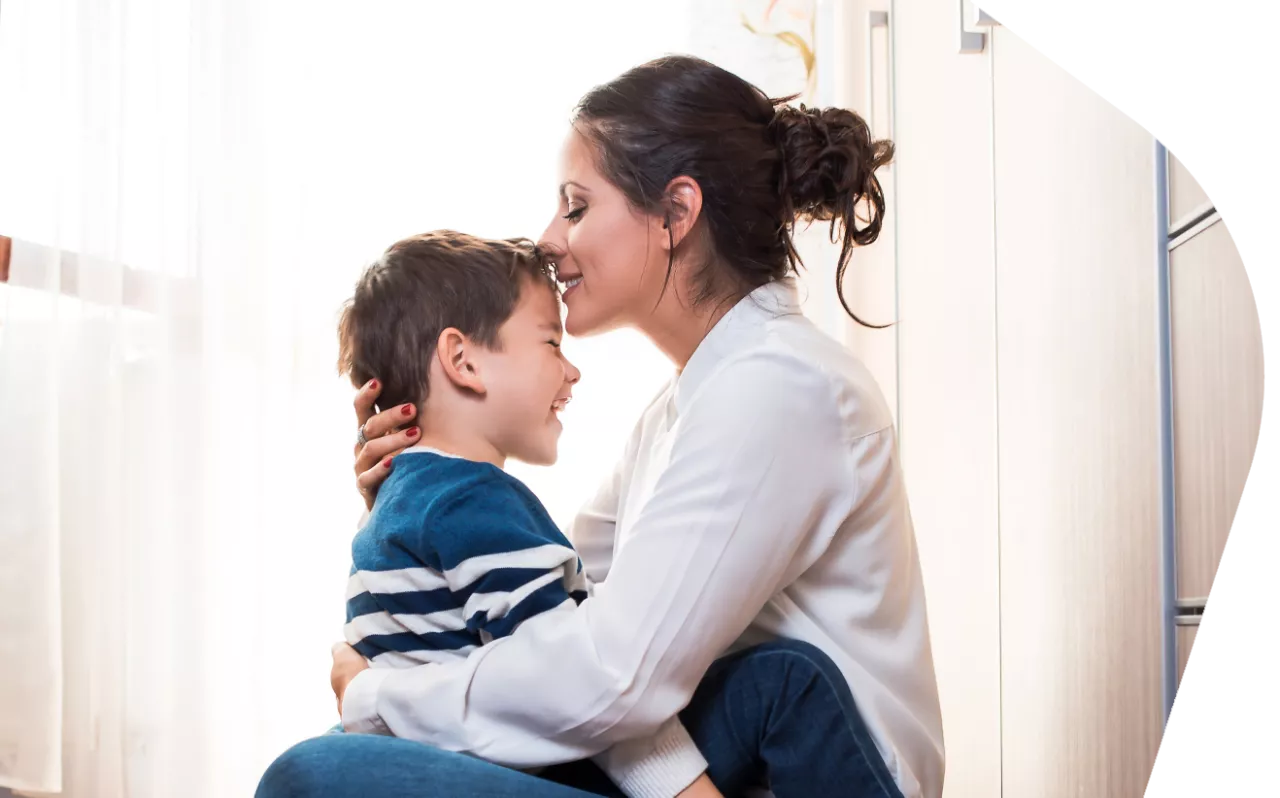 Photo: Mother hugging child