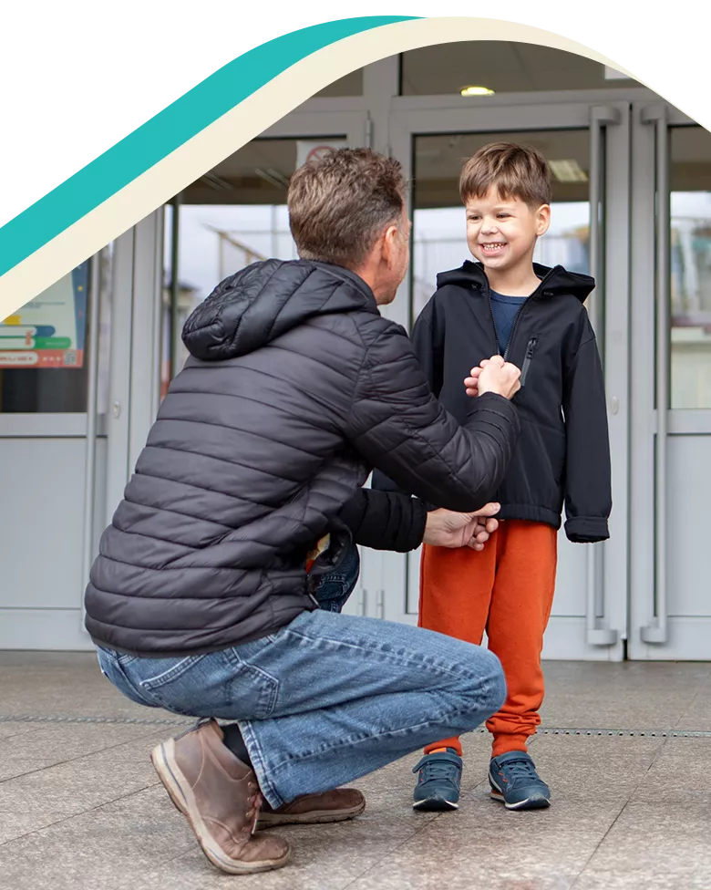 Father collecting child from school