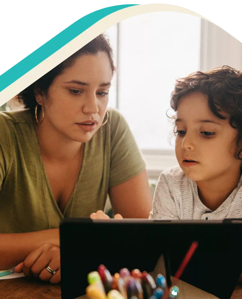 Photo: Mother and child looking at a tablet